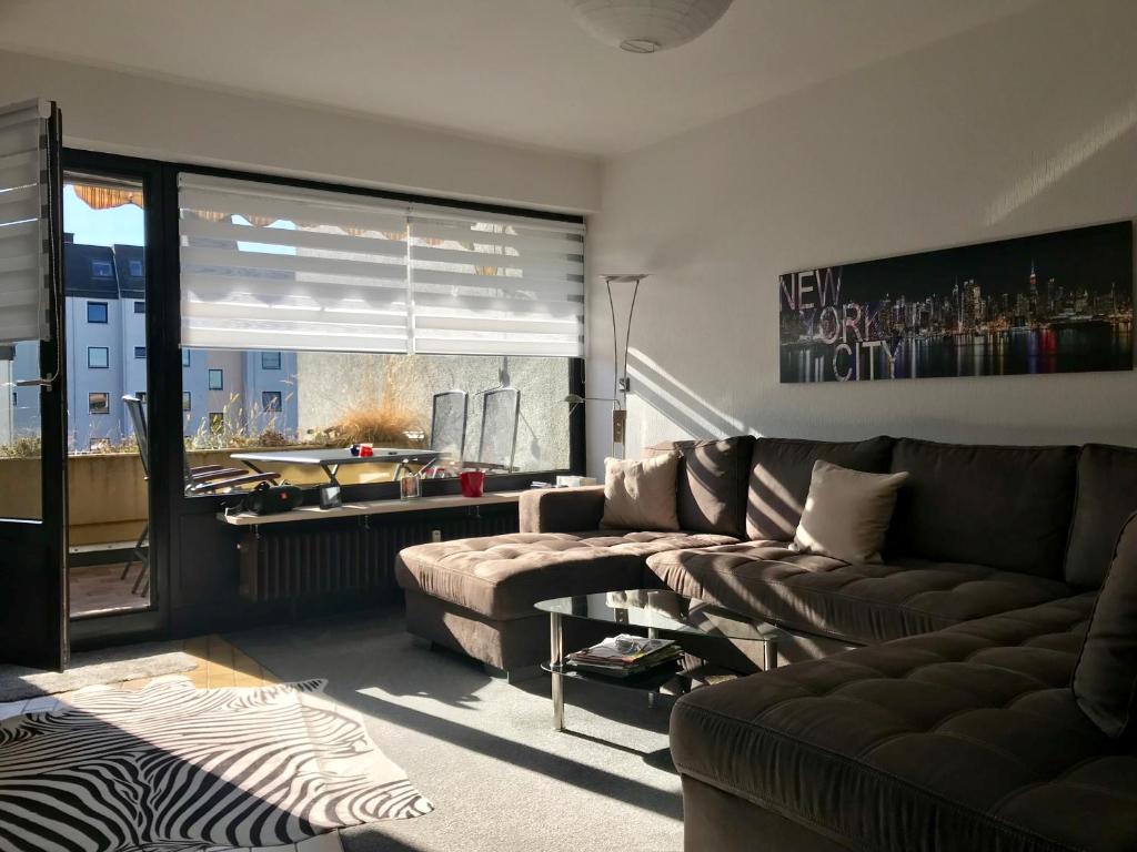 Zona de estar de ProFair Private Apartments & Rooms near Messe - room agency