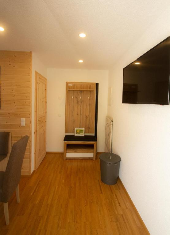 TV a/nebo společenská místnost v ubytování Appartement Sonnblick Kuschelsuite in den Bergen