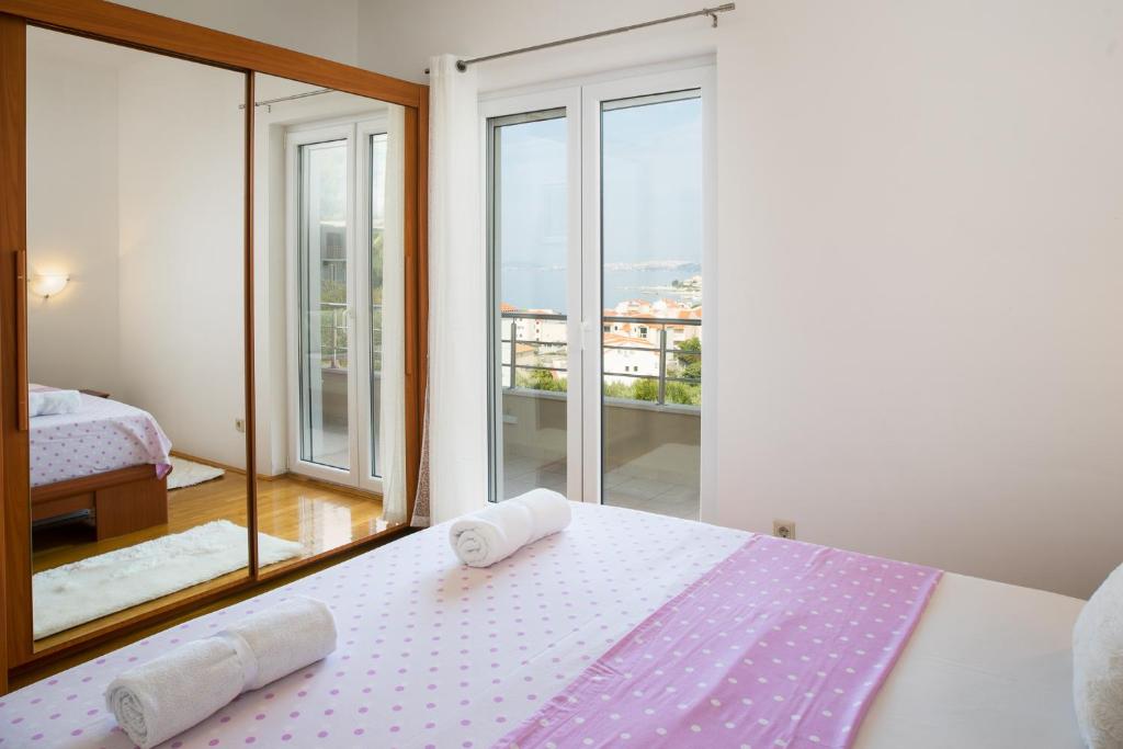 Postel nebo postele na pokoji v ubytování Apartment Toma