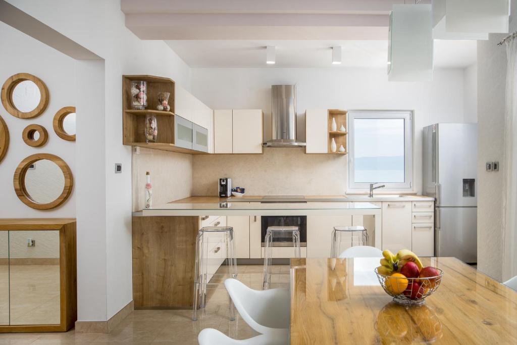 A kitchen or kitchenette at Apartment Toma