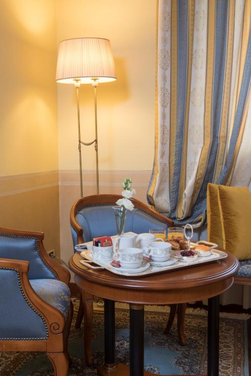 Posezení v ubytování Villa Pace Park Hotel Bolognese