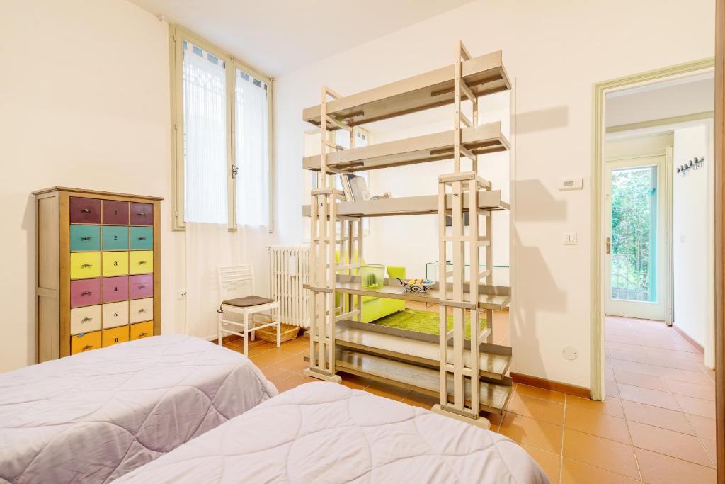 Posteľ alebo postele v izbe v ubytovaní Torre dell'Orologio Apartment