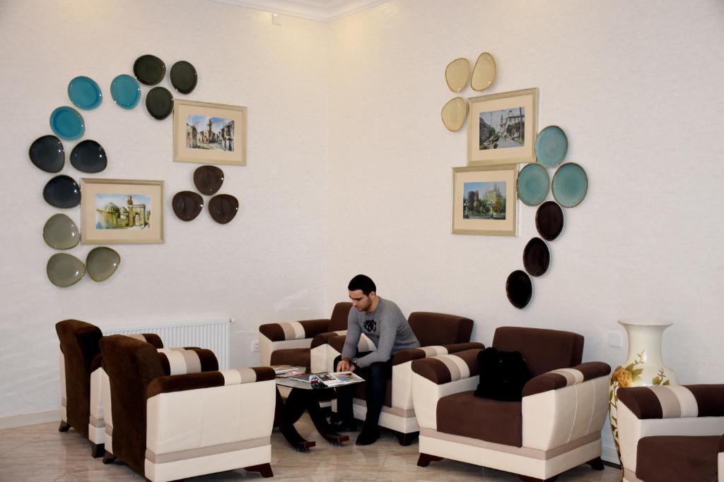 Posezení v ubytování Consul Hotel