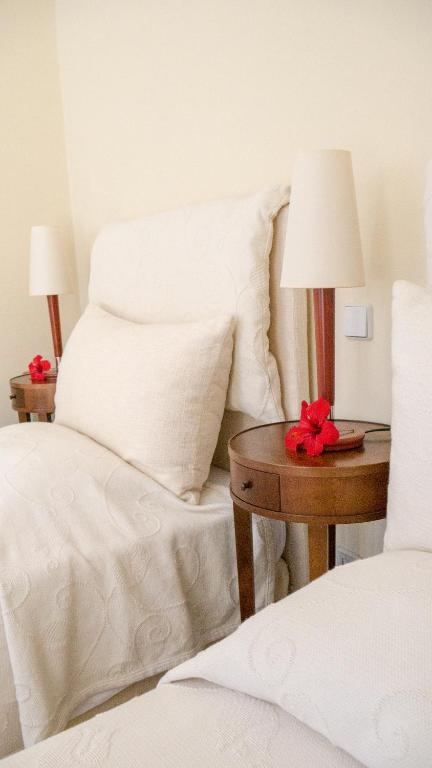 A bed or beds in a room at Villa Andromeda