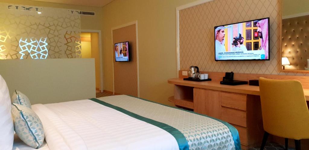 TV a/nebo společenská místnost v ubytování Jacob's Garden Hotel