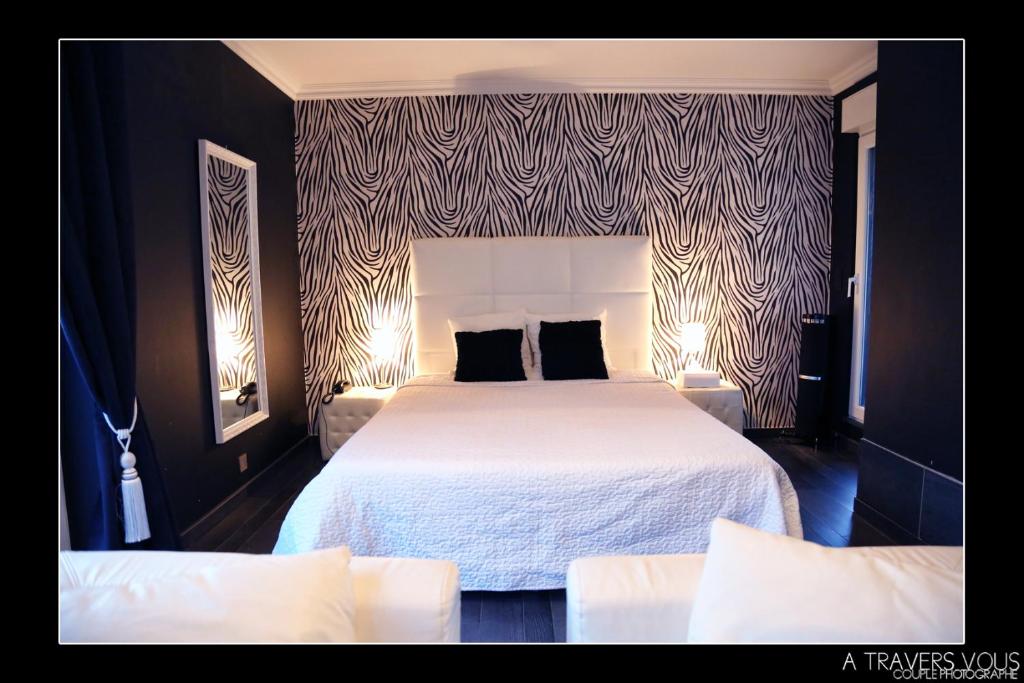 Postel nebo postele na pokoji v ubytování V E R O N E - Rooms & Suites - Liège - Rocourt