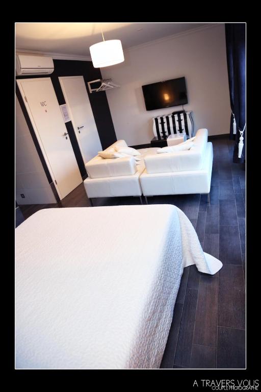 Postel nebo postele na pokoji v ubytování V E R O N E - Rooms & Suites - Liège - Rocourt