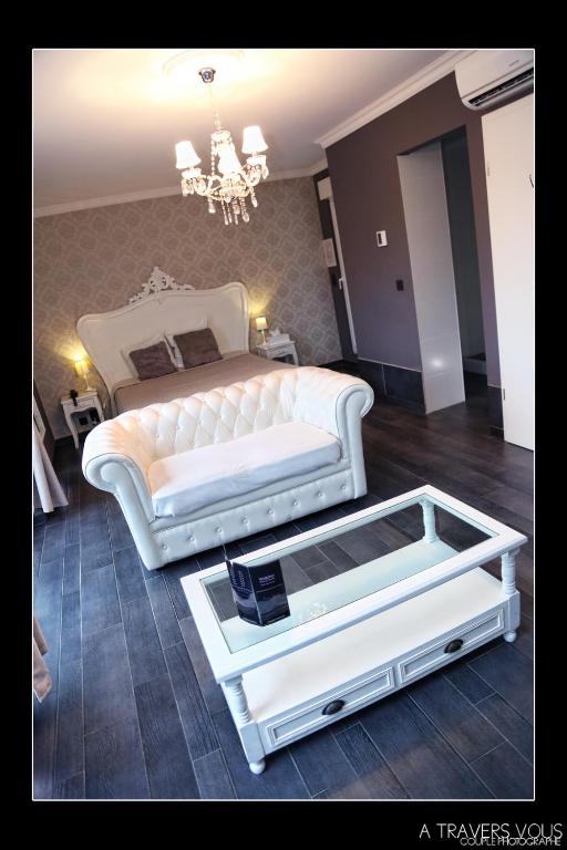 Postel nebo postele na pokoji v ubytování V E R O N E - Rooms & Suites - Liège - Rocourt