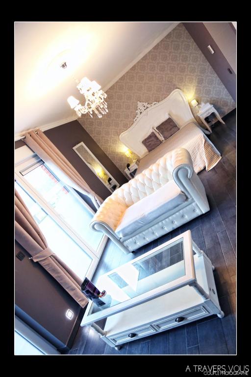 Postel nebo postele na pokoji v ubytování V E R O N E - Rooms & Suites - Liège - Rocourt
