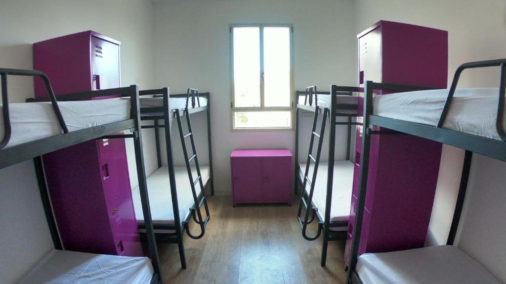 Postel nebo postele na pokoji v ubytování Haifa Hostel