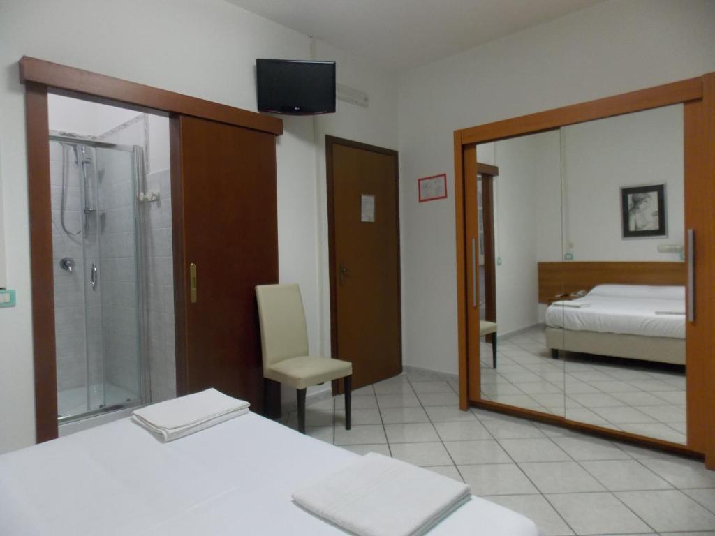 Postel nebo postele na pokoji v ubytování Hotel Villa dei Butteri - Aprilia