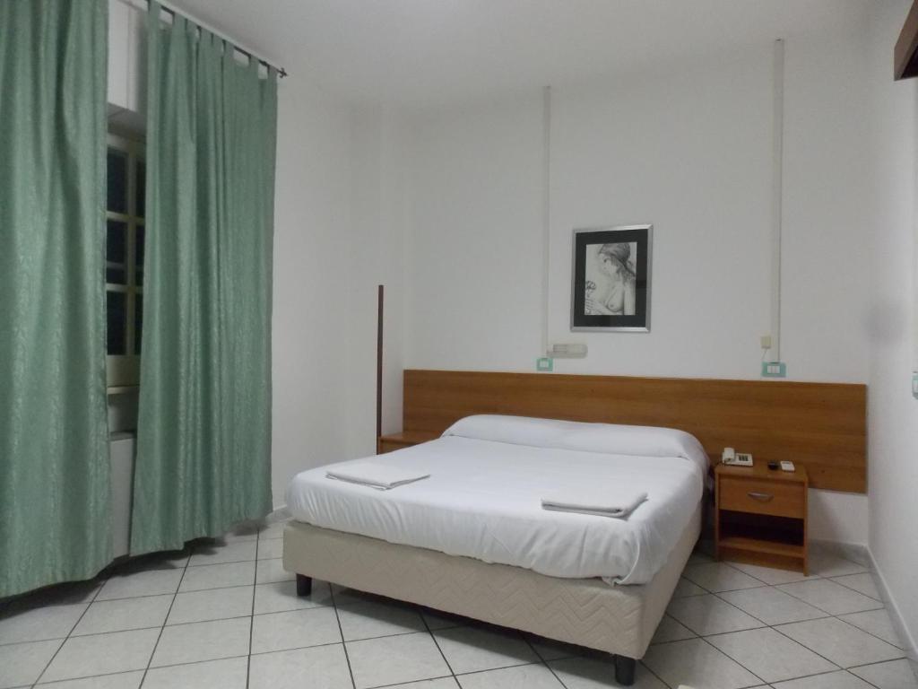Postel nebo postele na pokoji v ubytování Hotel Villa dei Butteri - Aprilia