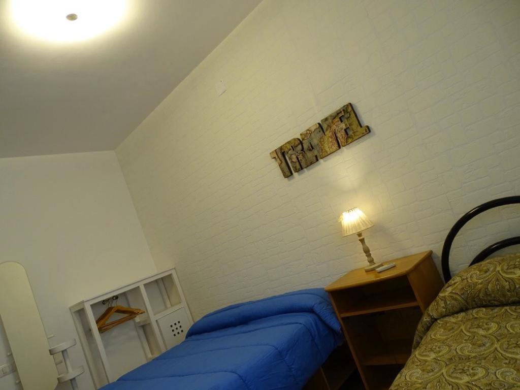 Posteľ alebo postele v izbe v ubytovaní Casa Papapietro