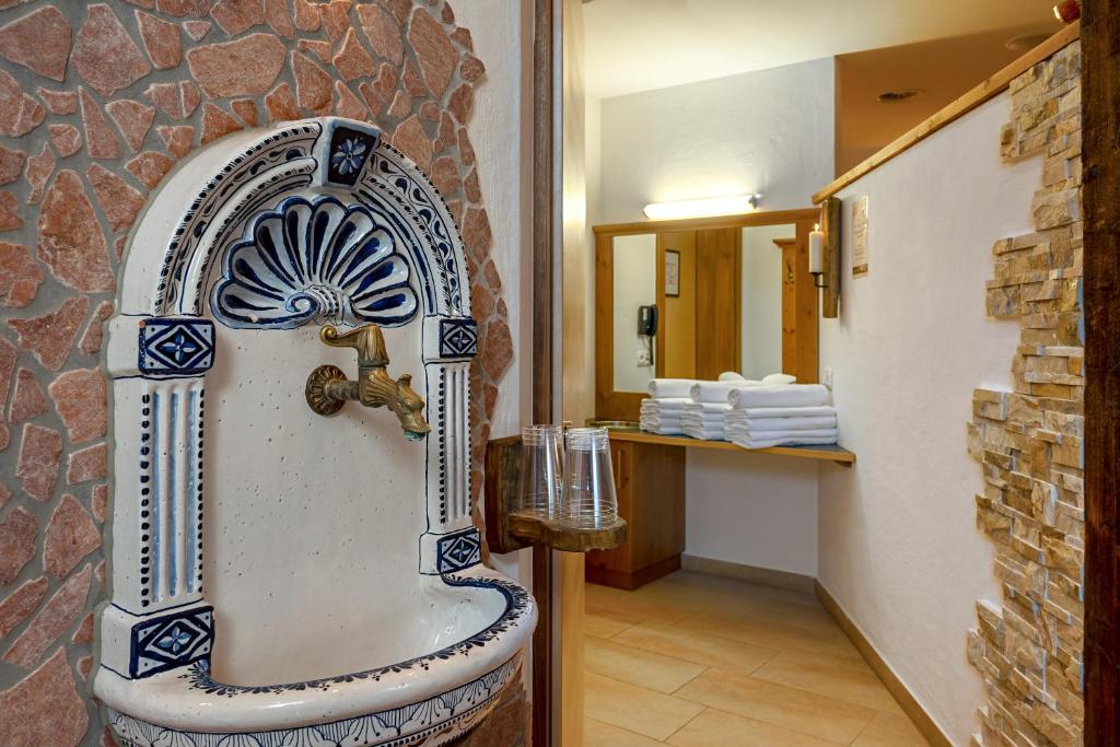 Koupelna v ubytování Apart-Hotel Aurora Fiss