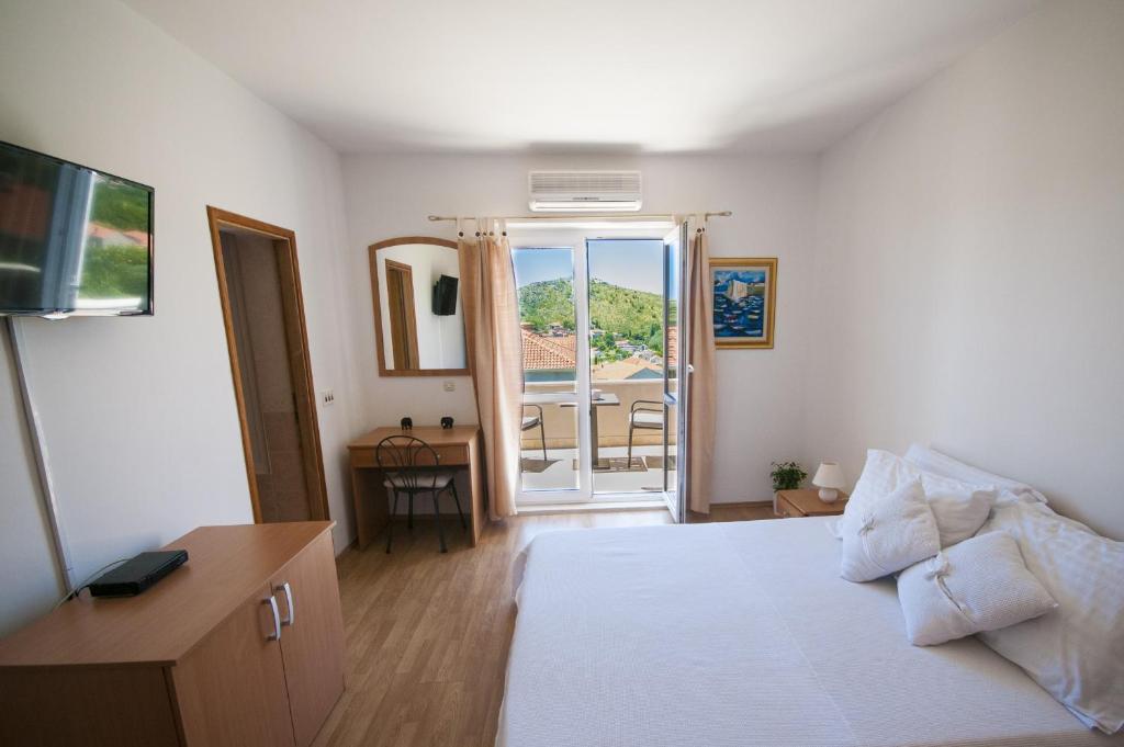 Posteľ alebo postele v izbe v ubytovaní Župa Dubrovačka Guest House