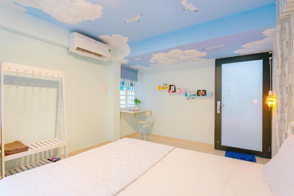 Postel nebo postele na pokoji v ubytování Qcub3 Homestay