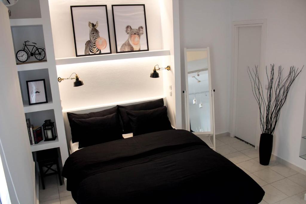 A bed or beds in a room at Super Stylish Apartments in Syntagma Square!