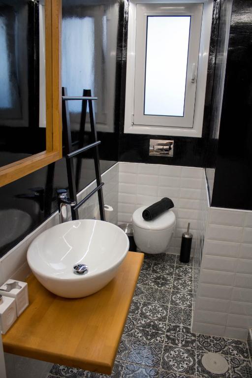 A bathroom at Super Stylish Apartments in Syntagma Square!