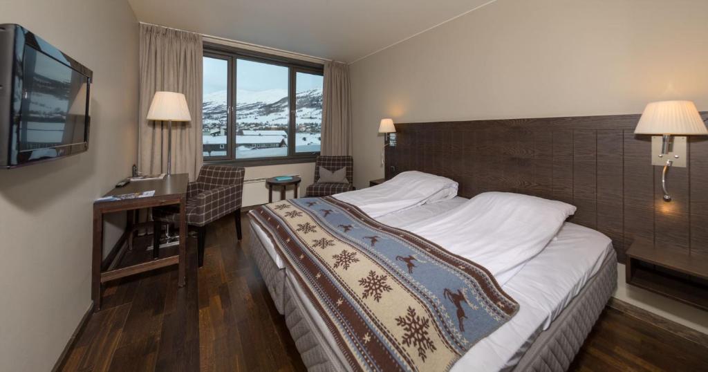 Postel nebo postele na pokoji v ubytování Quality Hotel Skifer
