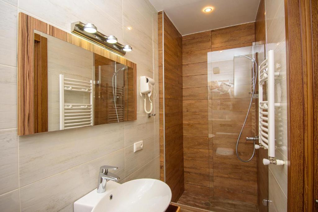 Koupelna v ubytování Hotel Libretto