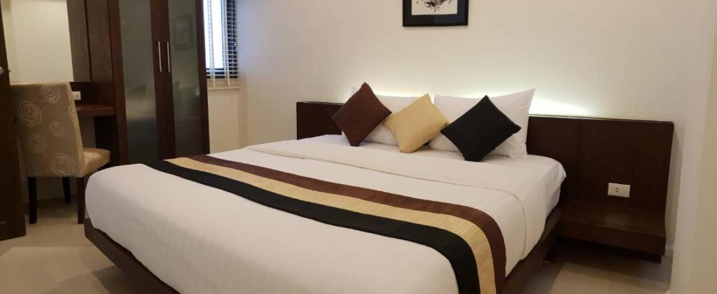 Postel nebo postele na pokoji v ubytování TSE Residence [by Samui Emerald]