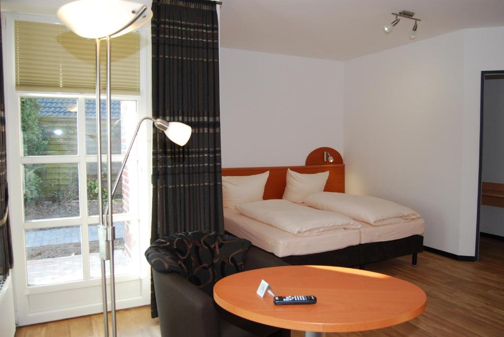 Postel nebo postele na pokoji v ubytování Hotel Waldquelle