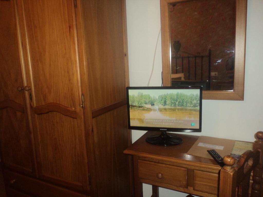 TV a/nebo společenská místnost v ubytování Hotel San Julian