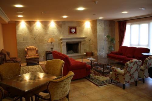 Posezení v ubytování Hotel Abeiras