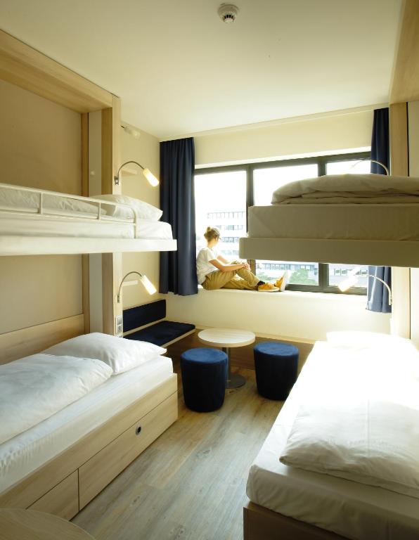 Postel nebo postele na pokoji v ubytování H2 Hotel Berlin-Alexanderplatz