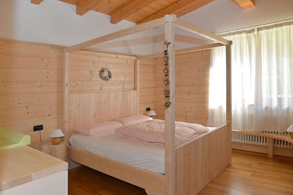 Postel nebo postele na pokoji v ubytování Andalo Chalet