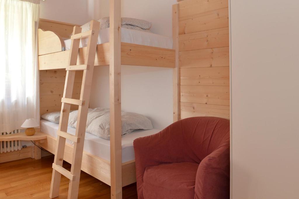 Postel nebo postele na pokoji v ubytování Andalo Chalet
