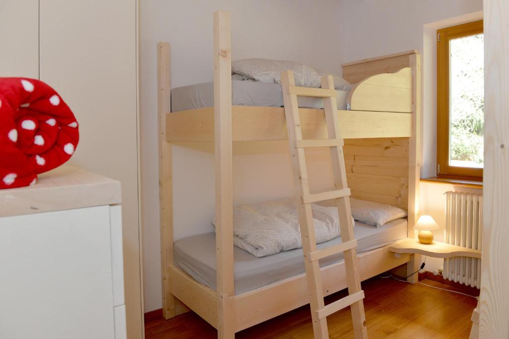 Postel nebo postele na pokoji v ubytování Andalo Chalet