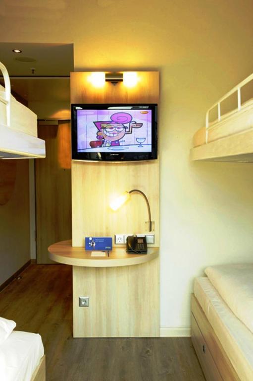 Postel nebo postele na pokoji v ubytování H2 Hotel Berlin-Alexanderplatz