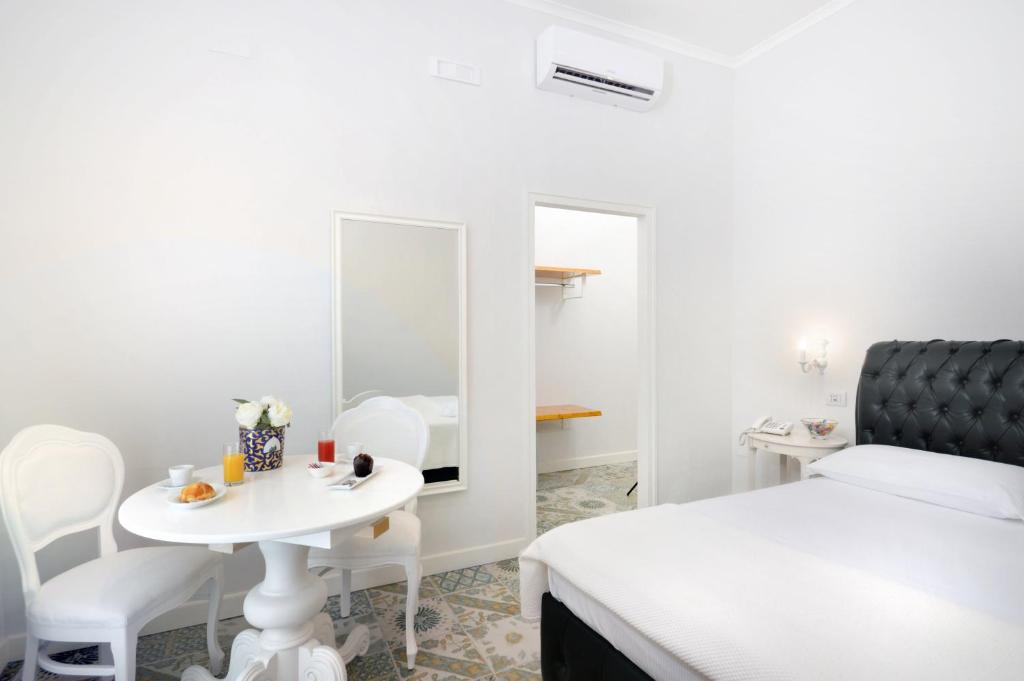Postel nebo postele na pokoji v ubytování Barbarella Home