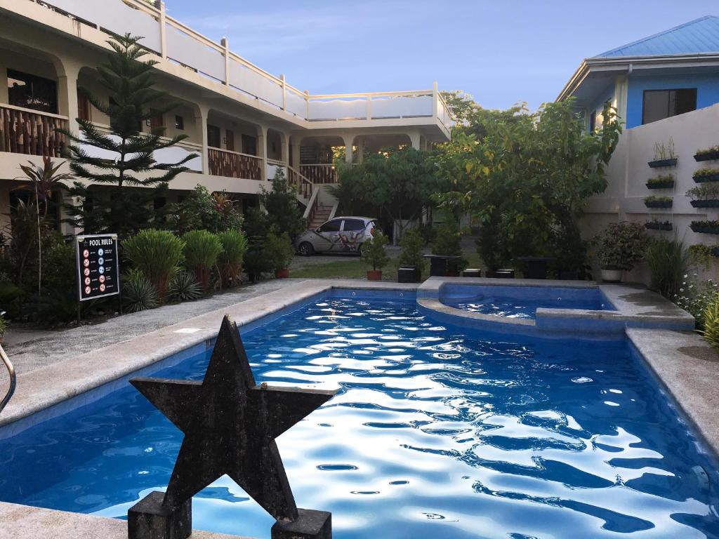 a star in the middle of a swimming pool at Stardust Beach Hotel in Lian