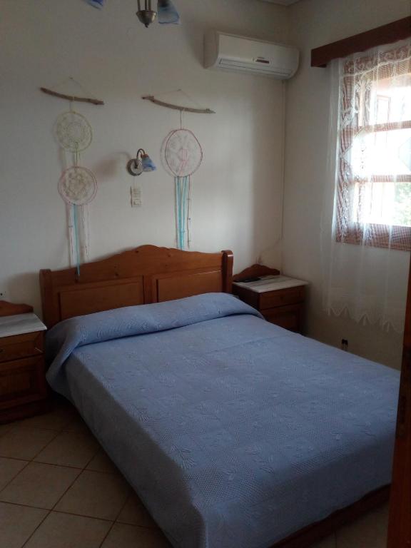 Postel nebo postele na pokoji v ubytování Tiki Rooms