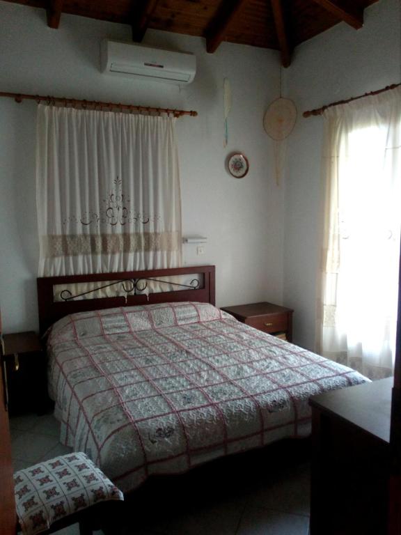 Postel nebo postele na pokoji v ubytování Tiki Rooms