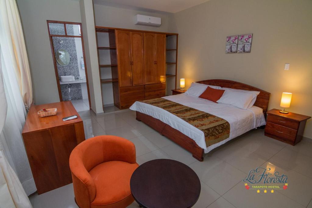 Postel nebo postele na pokoji v ubytování La Floresta Tarapoto Hostal