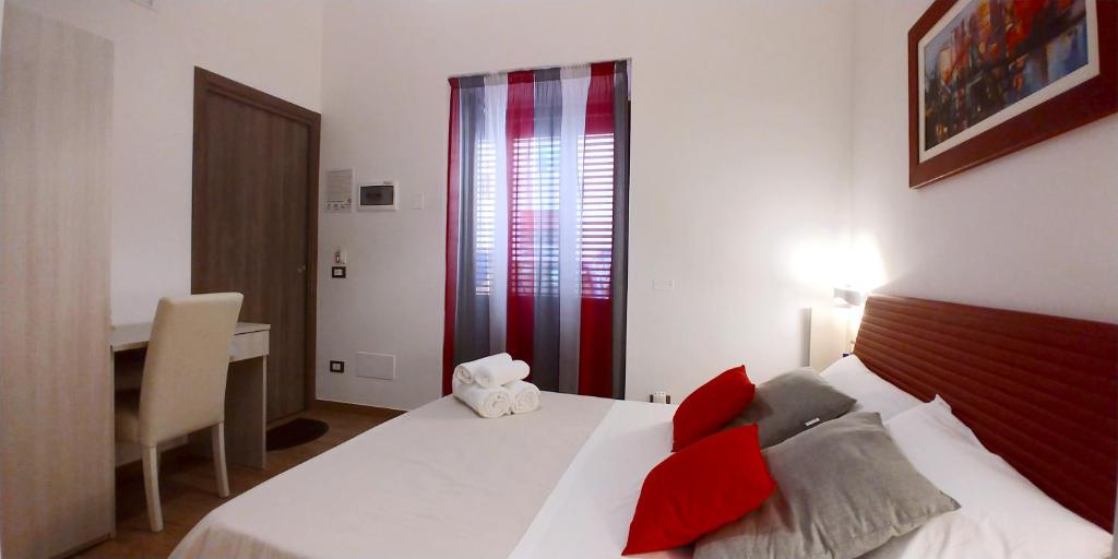 Postel nebo postele na pokoji v ubytování B&B Il Campanile