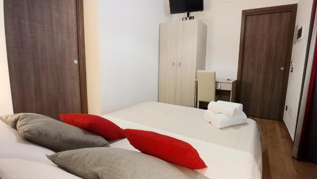 Postel nebo postele na pokoji v ubytování B&B Il Campanile