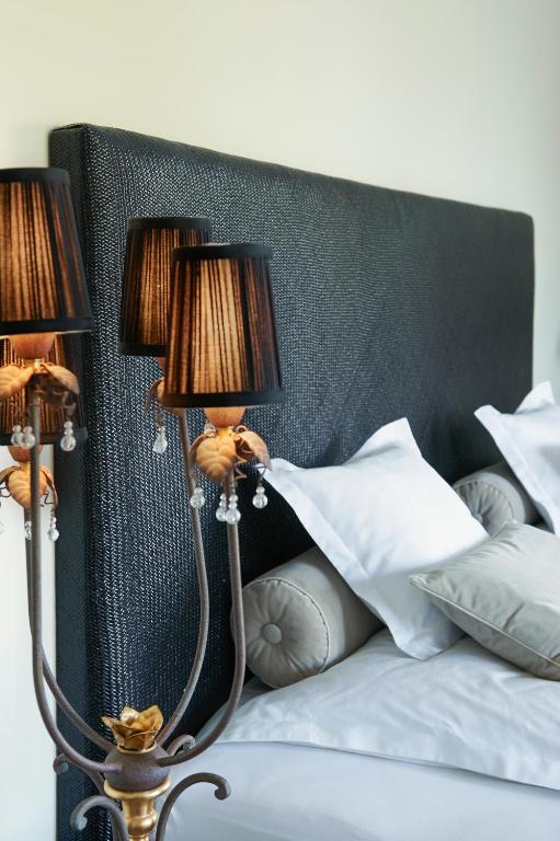 Postel nebo postele na pokoji v ubytování Hotel VILLINO