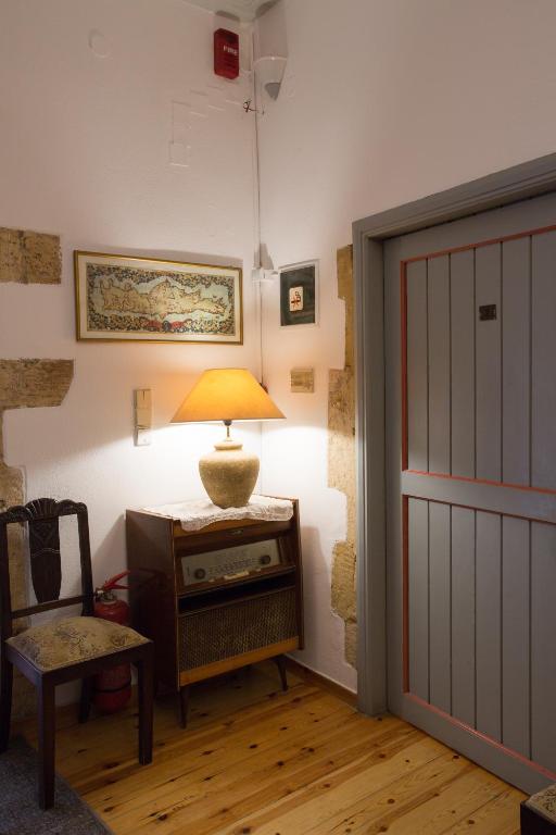 Postel nebo postele na pokoji v ubytování Nostos Hotel