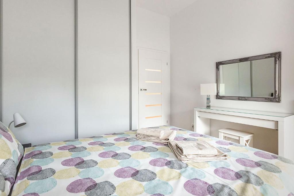 Posteľ alebo postele v izbe v ubytovaní Perfect Apartament