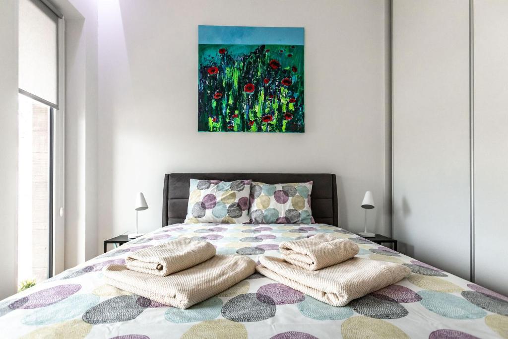 Posteľ alebo postele v izbe v ubytovaní Perfect Apartament