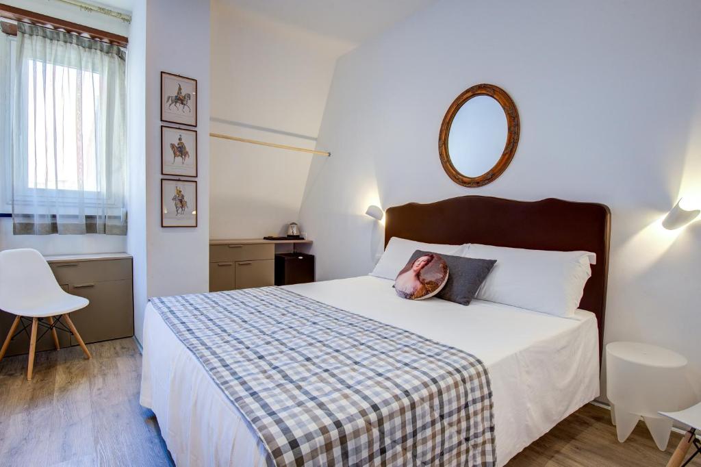 Postel nebo postele na pokoji v ubytování Hotel Bernina