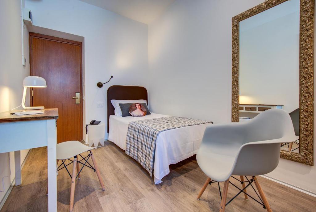 Postel nebo postele na pokoji v ubytování Hotel Bernina