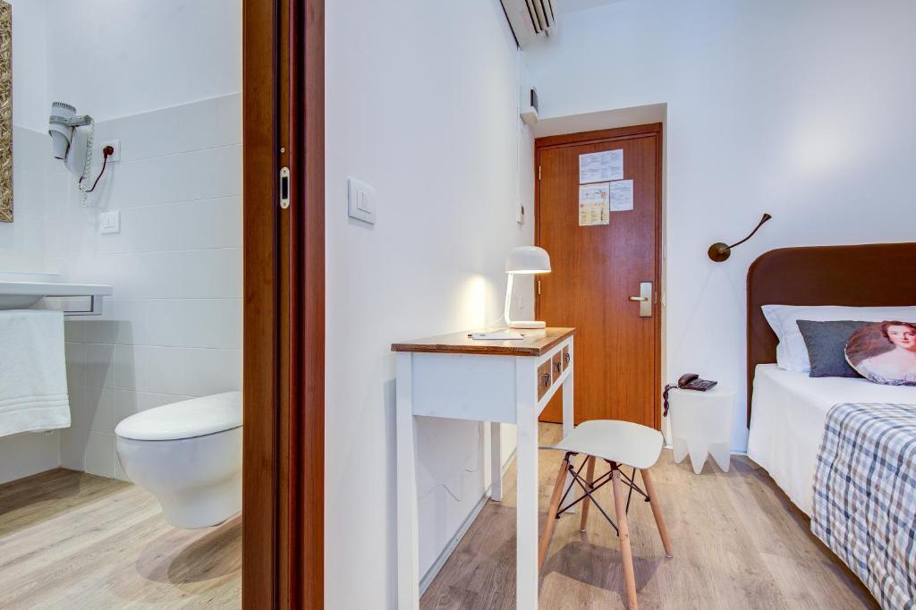 Postel nebo postele na pokoji v ubytování Hotel Bernina