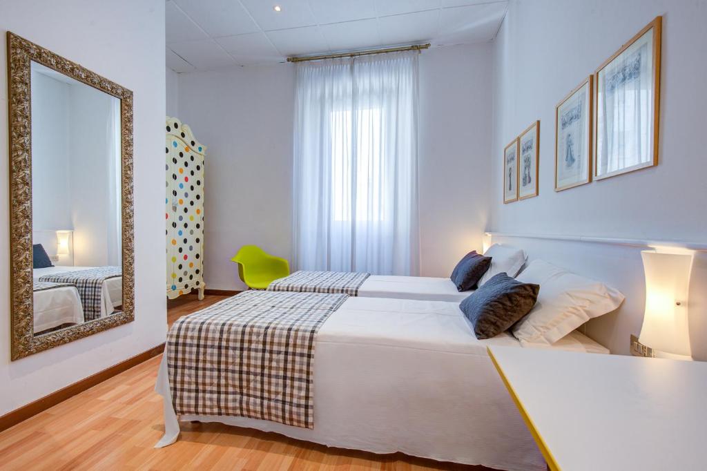 Postel nebo postele na pokoji v ubytování Hotel Bernina