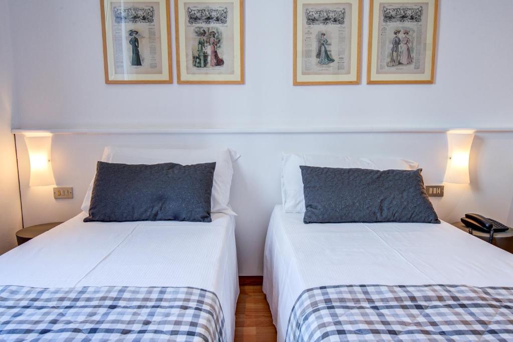 Postel nebo postele na pokoji v ubytování Hotel Bernina