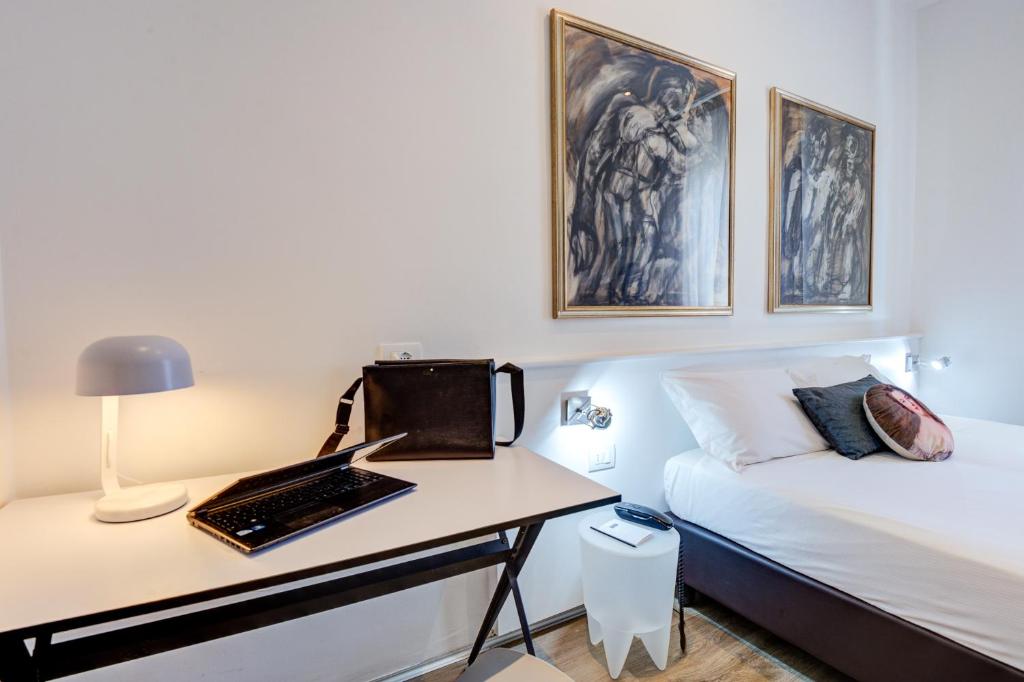 Postel nebo postele na pokoji v ubytování Hotel Bernina
